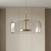 Scandinavian pendant light in clear glass, wide drum shade with a brushed brass disc, BO-HA Astrid