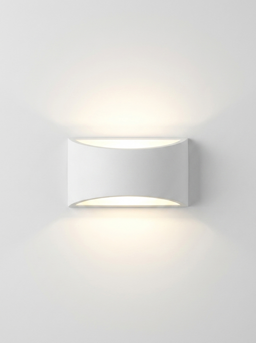 Kaia – plaster Japandi up and down wall sconce – matte white sculptural form with curved top and bottom cutouts