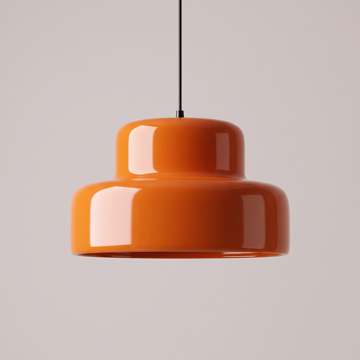 Sunna orange Bauhaus pendant light on a black cord, two-tier lacquered iron shade shown against a pale grey studio background
